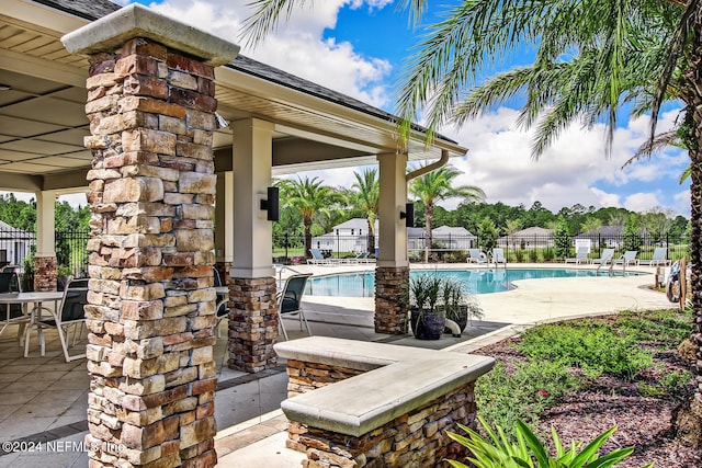 view of pool featuring a gazebo and a patio area