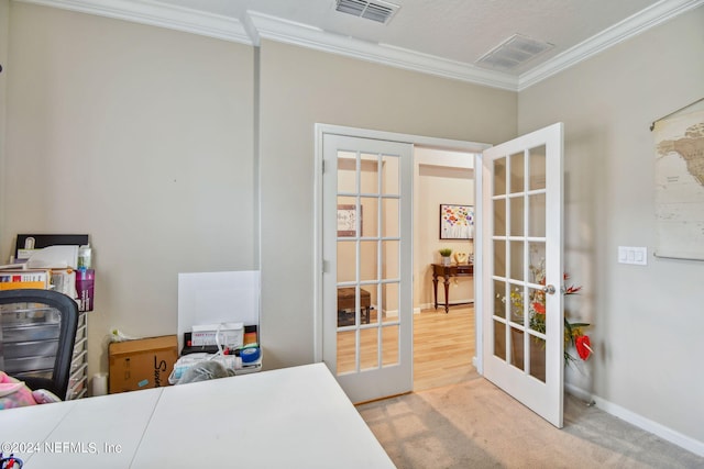 bedroom featuring crown molding, carpet flooring, and french doors