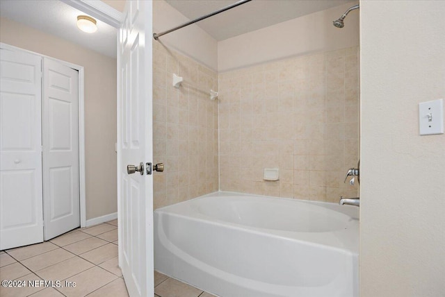 bathroom with tile patterned flooring and tiled shower / bath combo