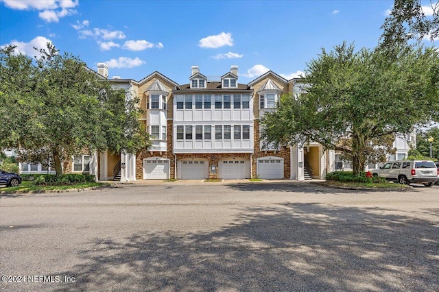 view of property featuring a garage