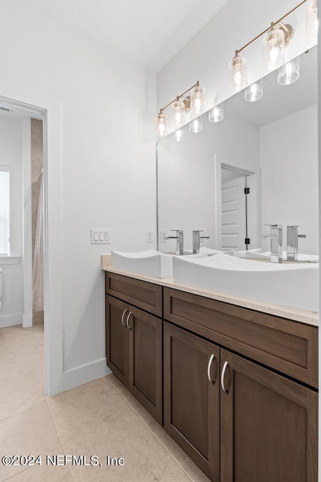 bathroom featuring vanity and tile patterned floors