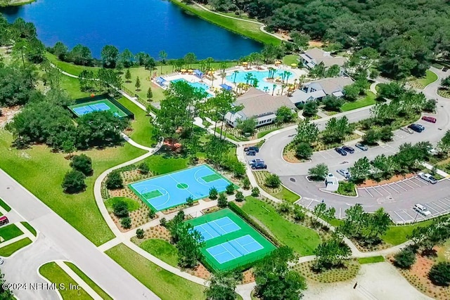 birds eye view of property featuring a water view