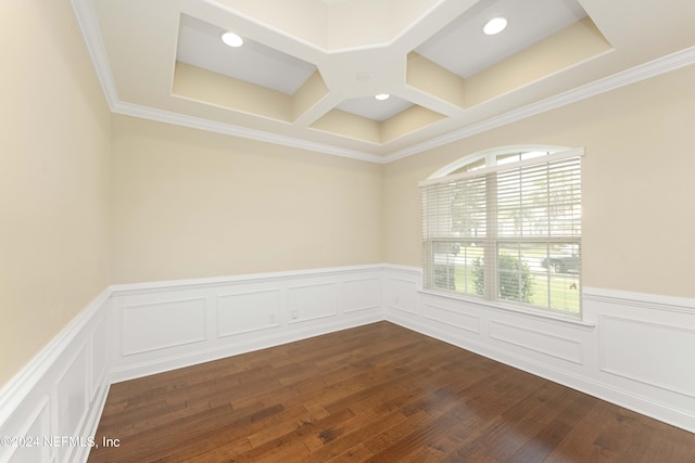 spare room with dark hardwood / wood-style flooring and crown molding