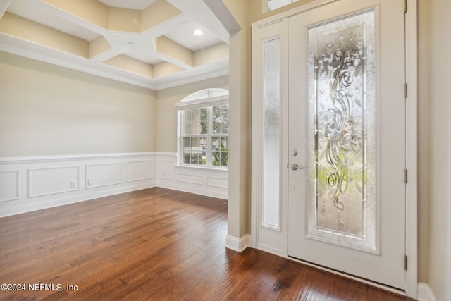 entrance foyer with coffered ceiling and dark hardwood / wood-style flooring