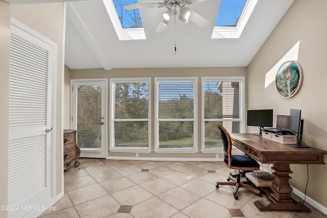 office featuring ceiling fan, lofted ceiling, and light tile patterned flooring