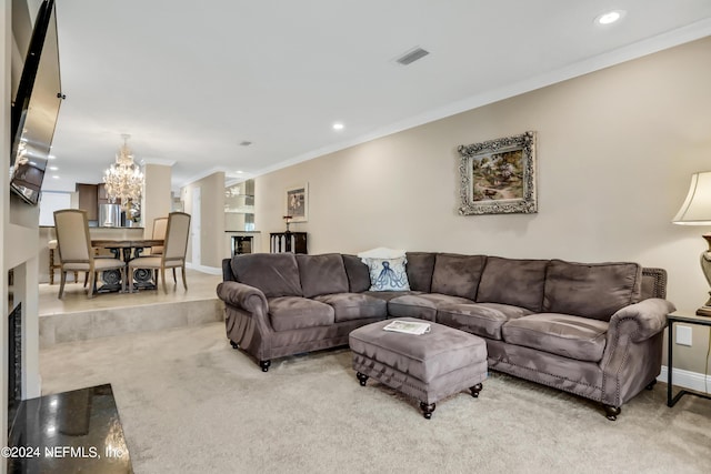 living room featuring a chandelier, built in shelves, carpet flooring, and crown molding