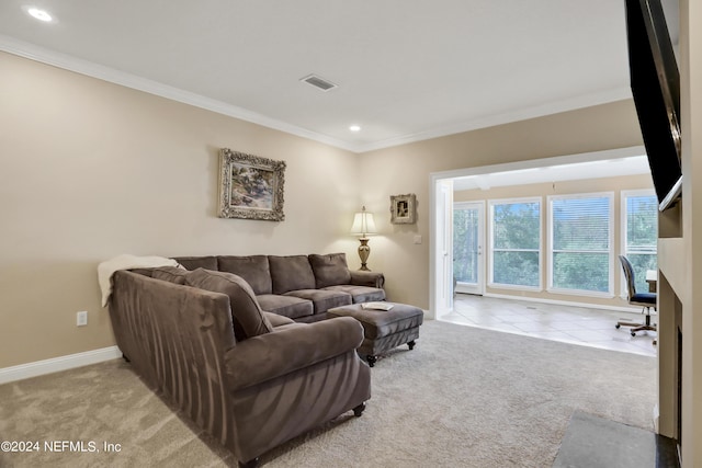 carpeted living room featuring ornamental molding