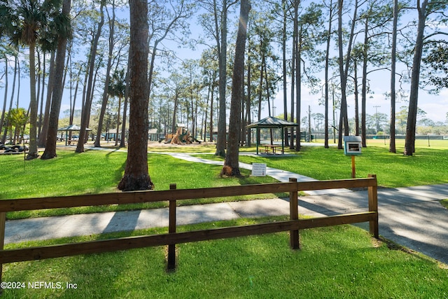 view of community with a gazebo and a yard