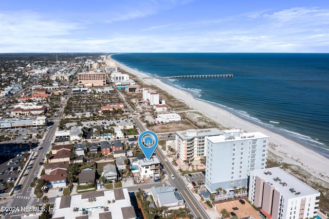 bird's eye view featuring a beach view and a water view