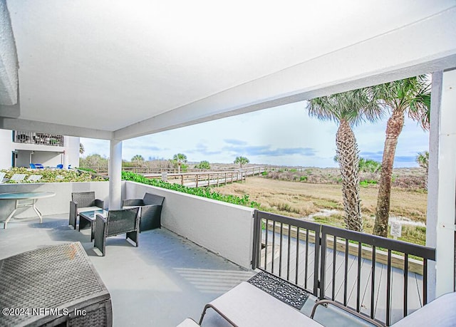 view of patio / terrace with a balcony