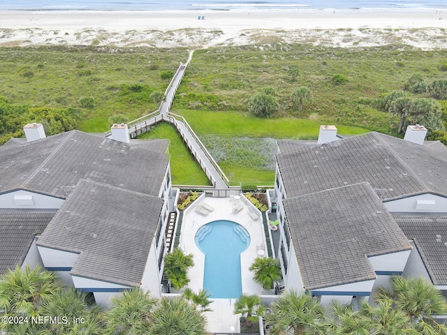 aerial view with a beach view and a water view