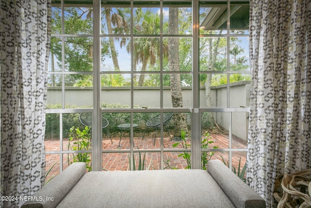 sunroom featuring plenty of natural light