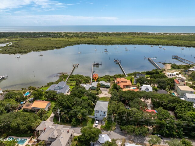 bird's eye view with a water view