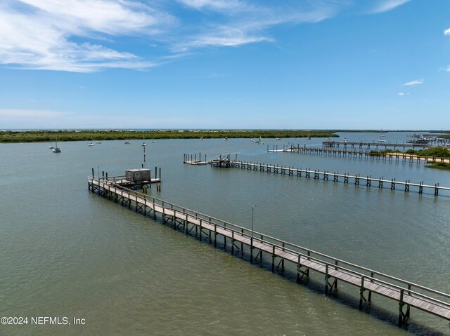 dock area featuring a water view and cooling unit