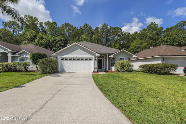 single story home with a front lawn and a garage