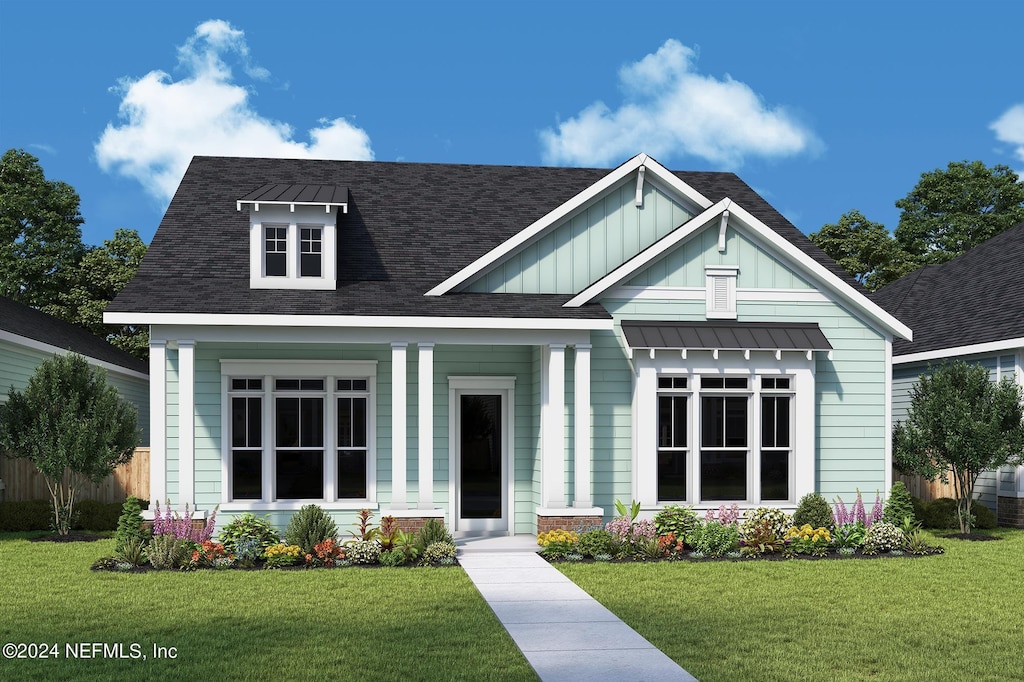 view of front of house featuring a porch and a front yard