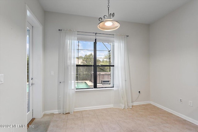 view of tiled spare room