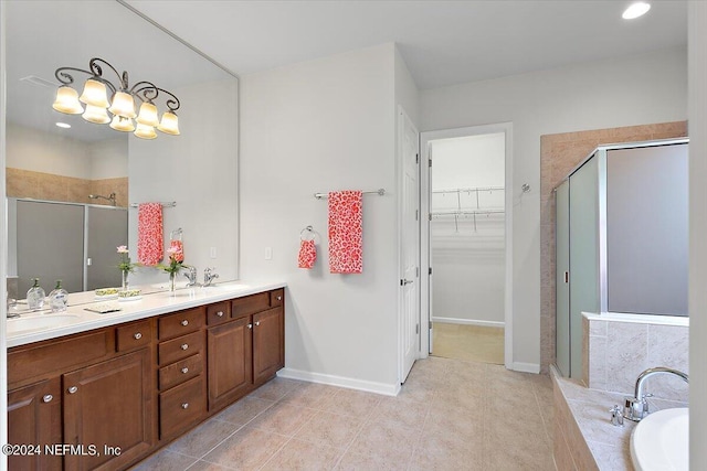 bathroom with tile patterned floors, vanity, and plus walk in shower