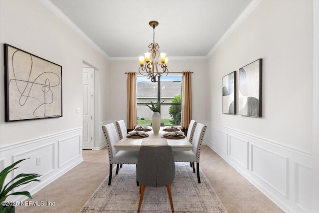 632 River Run Blvd, Ponte Vedra, FL 32081 - dining room with a decorative wall, wainscoting, a notable chandelier, and crown molding