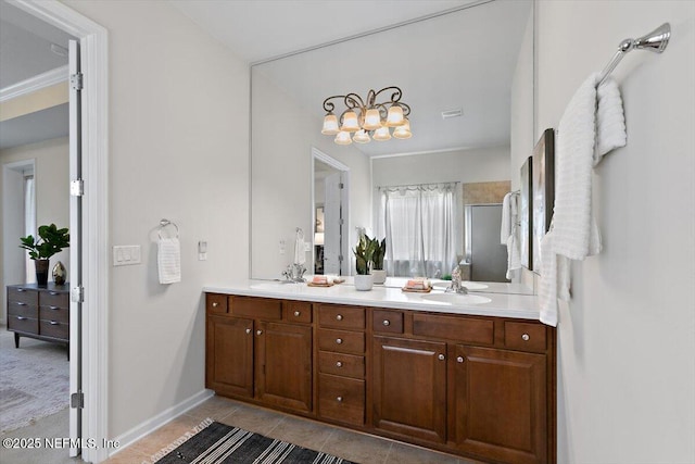 632 River Run Blvd, Ponte Vedra, FL 32081 - full bathroom featuring a sink, double vanity, an inviting chandelier, and a shower with shower door