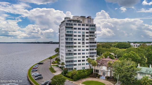 view of building exterior with a water view