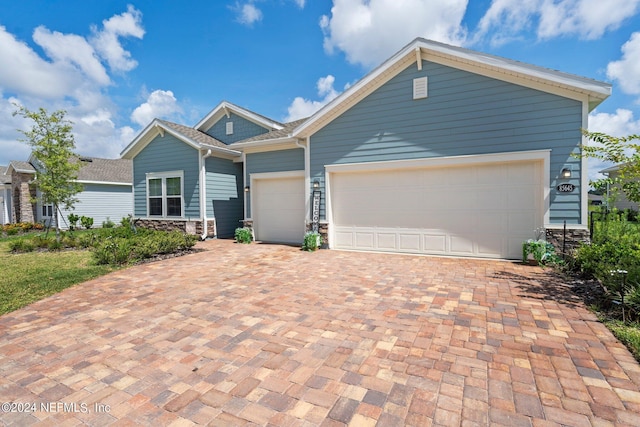 view of front of home with a garage