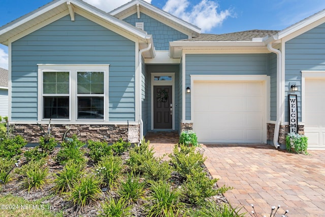 craftsman house with a garage