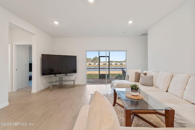 living room featuring light hardwood / wood-style flooring