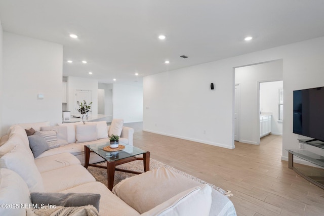 living room featuring light wood-type flooring