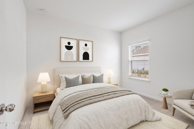 bedroom with light colored carpet