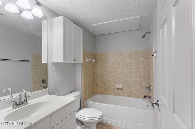 full bath featuring shower / bath combination, toilet, a textured ceiling, vanity, and tile patterned floors