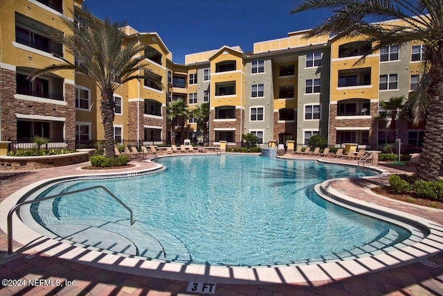 pool featuring a patio