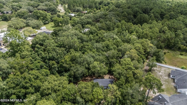 bird's eye view with a forest view