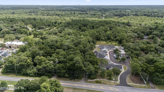 bird's eye view with a forest view