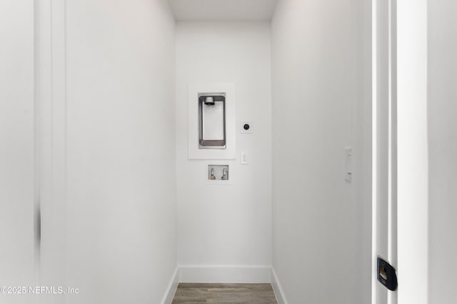 laundry room featuring washer hookup, electric dryer hookup, and hardwood / wood-style floors