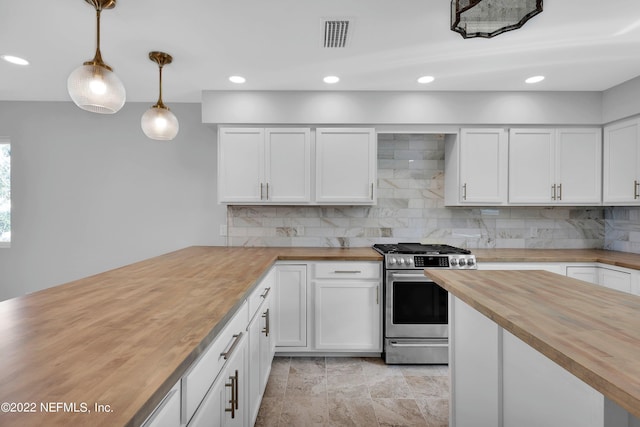 kitchen with white cabinetry, decorative light fixtures, wood counters, and stainless steel gas stove