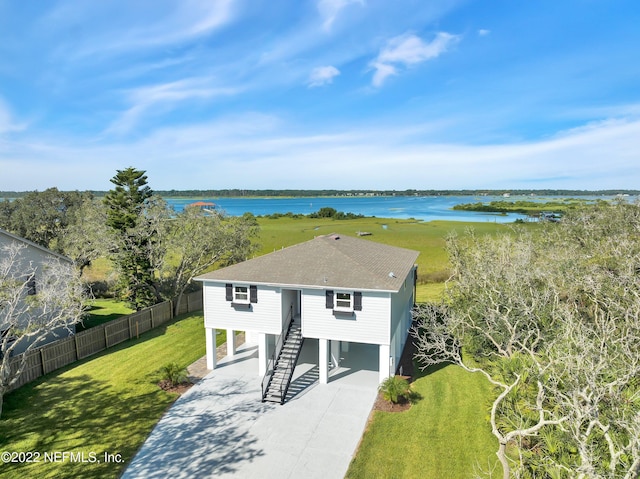 exterior space with a water view