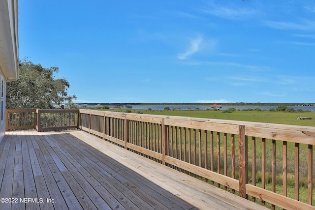 deck featuring a water view