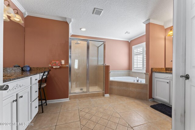 bathroom with ornamental molding, vanity, and tile patterned floors