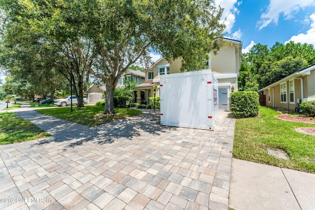 view of front of house with a front lawn