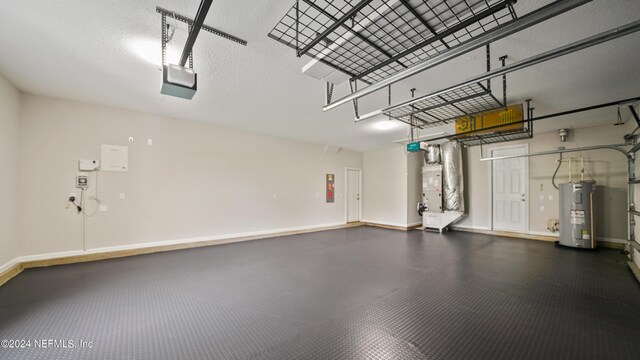 garage featuring electric panel, heating unit, a garage door opener, and water heater