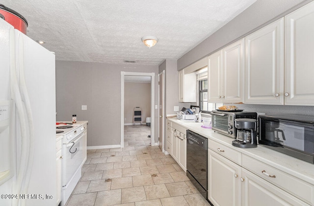 kitchen featuring light tile patterned flooring, white cabinetry, a textured ceiling, and white appliances