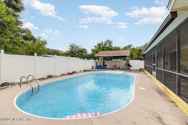 view of pool featuring a patio and a gazebo