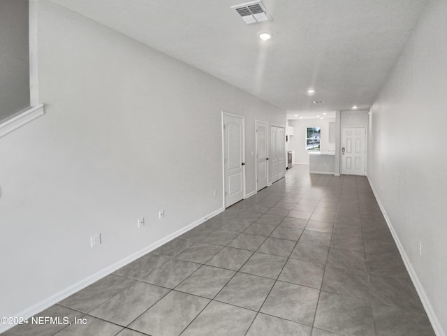 interior space featuring light tile patterned floors