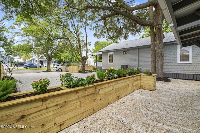 view of yard with a residential view and fence