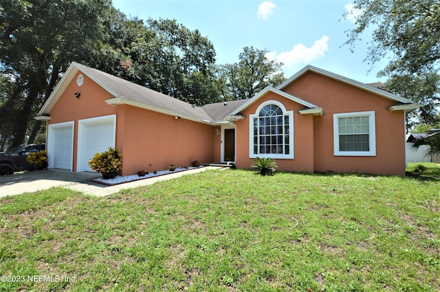 single story home featuring a front yard and a garage