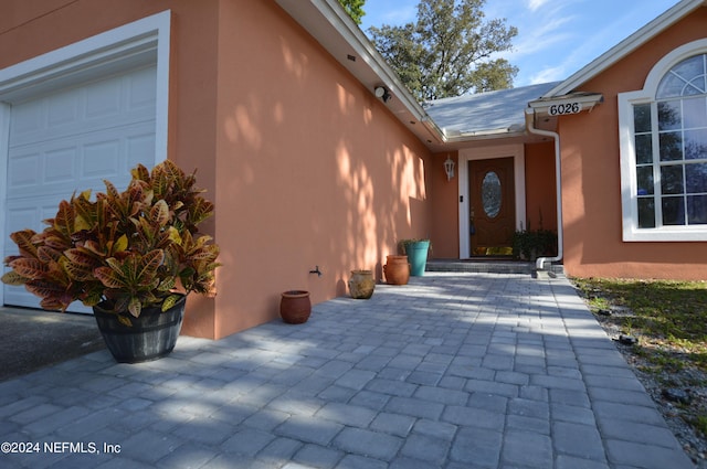 entrance to property with a garage