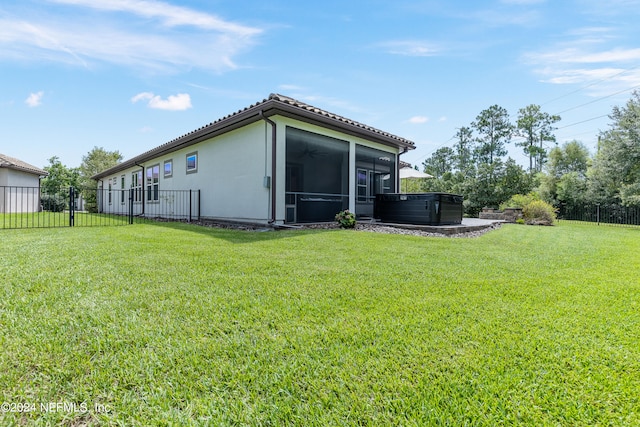 view of yard with a sunroom