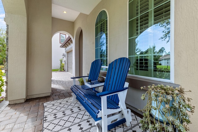 view of patio with a garage