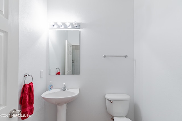 bathroom with a sink and toilet